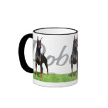 3 black Doberman Pinschers w/ breed name graphic Mugs
