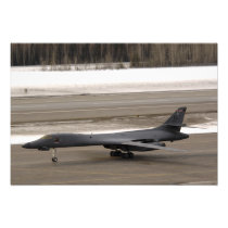 A B-1B Lancer performs a touch and go