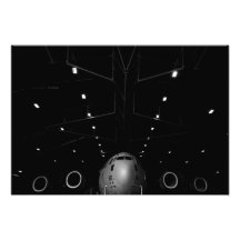 A C-17 Globemaster III sits in a hangar Photo Print