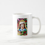 A christmas greeting with a child photo in the bel mug