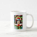 A christmas greeting with a child photo in the bel mug