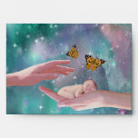 A cute baby boy in hand fantasy envelope