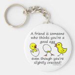 A friend is someone key chain