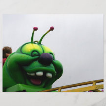 A green caterpillar goofy fair ride image flyer design