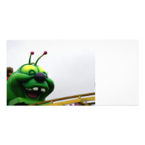 A green caterpillar goofy fair ride image picture card