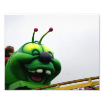 A green caterpillar goofy fair ride image photo art