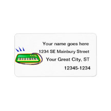 A green keytar with a blue strap graphic, custom address label