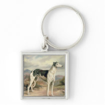 A Greyhound in a hilly landscape Keychain