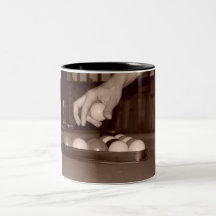 A hand in the game coffee mug