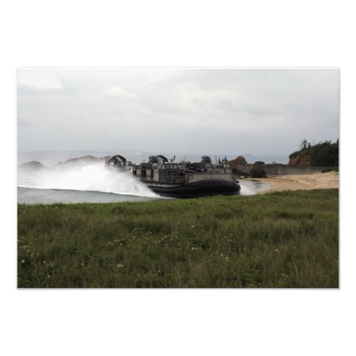 A landing craft air cushion comes ashore photo