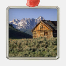 A log cabin and the Sawtooth Mountains in Christmas Tree Ornament