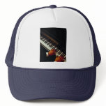 A man playing piano hats