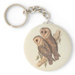 A Pair of Masked Barn Owls on a branch (painting). keychains