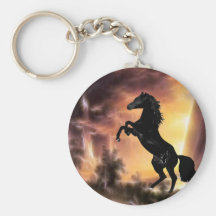 A rearing stallion at sunset keychain