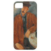 A seated man leaning on a table casemate cases