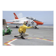 A shooter aboard the aircraft carrier photo