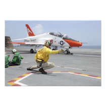 A shooter aboard the aircraft carrier photo
