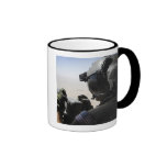 A soldier provides security coffee mug