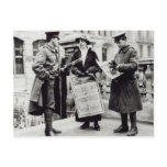 A Suffragette selling newspapers to two Post Cards