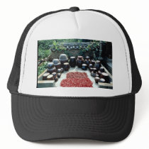 A terrace where soy sauce crocks are placed trucker hats