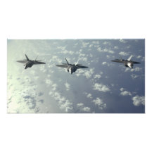 A three-ship formation of F-22 Raptors Photo Art