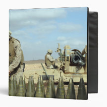 A US Marine prepares howitzer rounds to be fire Vinyl Binders