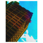 A vibrant and tall building against the  blue sky flyers