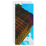 A vibrant and tall building against the  blue sky rack cards