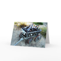 A wagon of wine bottles greeting card
