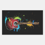 Acoustic guitar with paint splatters stickers