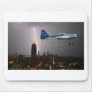 Aerobatic airplane in lightning mousepads