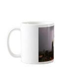 Aerobatic airplane in lightning mug