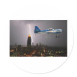 Aerobatic airplane in lightning stickers