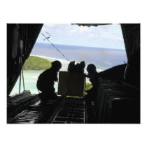 Airmen push out a pallet of donated goods 2
