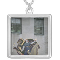 Allegorical scene necklaces