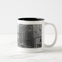 American city with commercial billboards coffee mugs