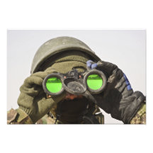 An Afghan soldier scans the horizon Photo