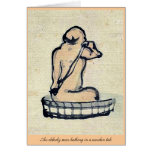 An elderly man bathing in a wooden tub card