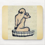 An elderly man bathing in a wooden tub mousepads