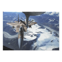 An F-15C Eagle aircraft sits behind a KC-135R Photograph