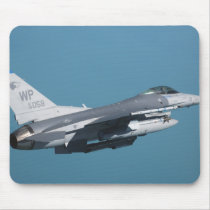 An F-16 Fighting Falcon in flight Mouse Pad