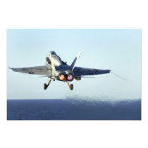An F/A-18C Hornet launches from the flight deck 2