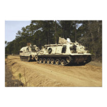 An M-88 recovery vehicle begins to tow an M992 Photograph