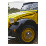 An old black and yellow Citroen 2CV 2 CV,