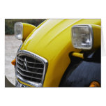 An old black and yellow Citroen 2CV 2 CV, detail Card