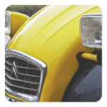 An old black and yellow Citroen 2CV 2 CV, detail Stickers