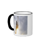 An United Launch Alliance Atlas V rocket lifts Coffee Mugs