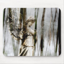 Angel Walks Through Winter Mouse Pads