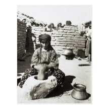 Assyrian refugee pounding bulgur in mortar postcard