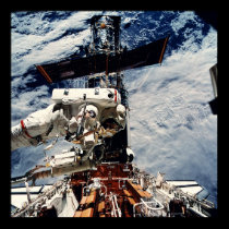 Astronaut working on the Hubble Space Telescope posters